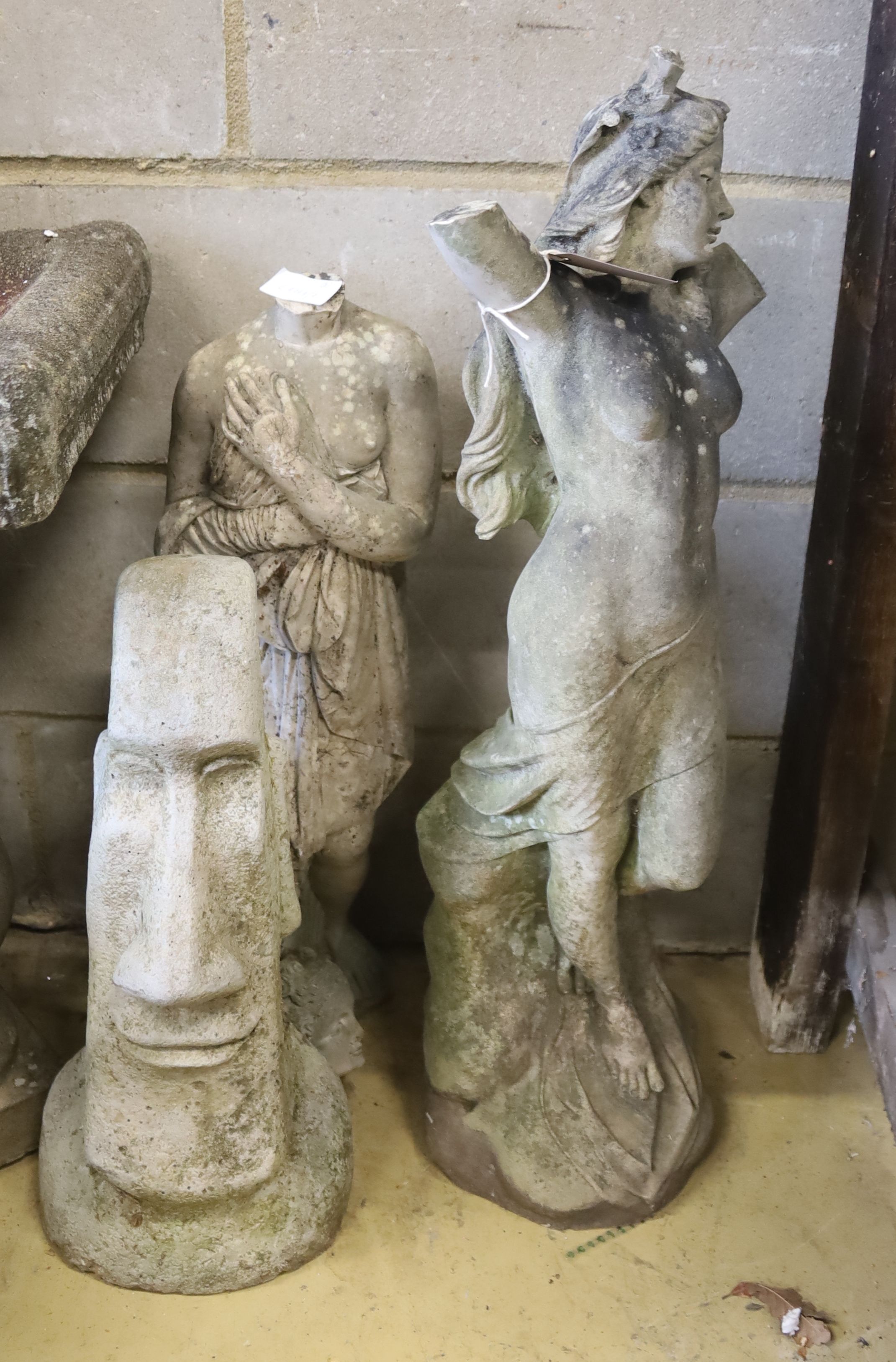 Three reconstituted stone and reconstituted marble garden ornaments, largest 80cm high